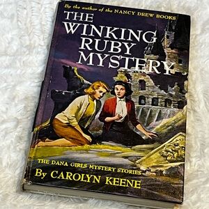 The Winking Ruby Mystery by Carolyn Keene - Black and Yellow Cover